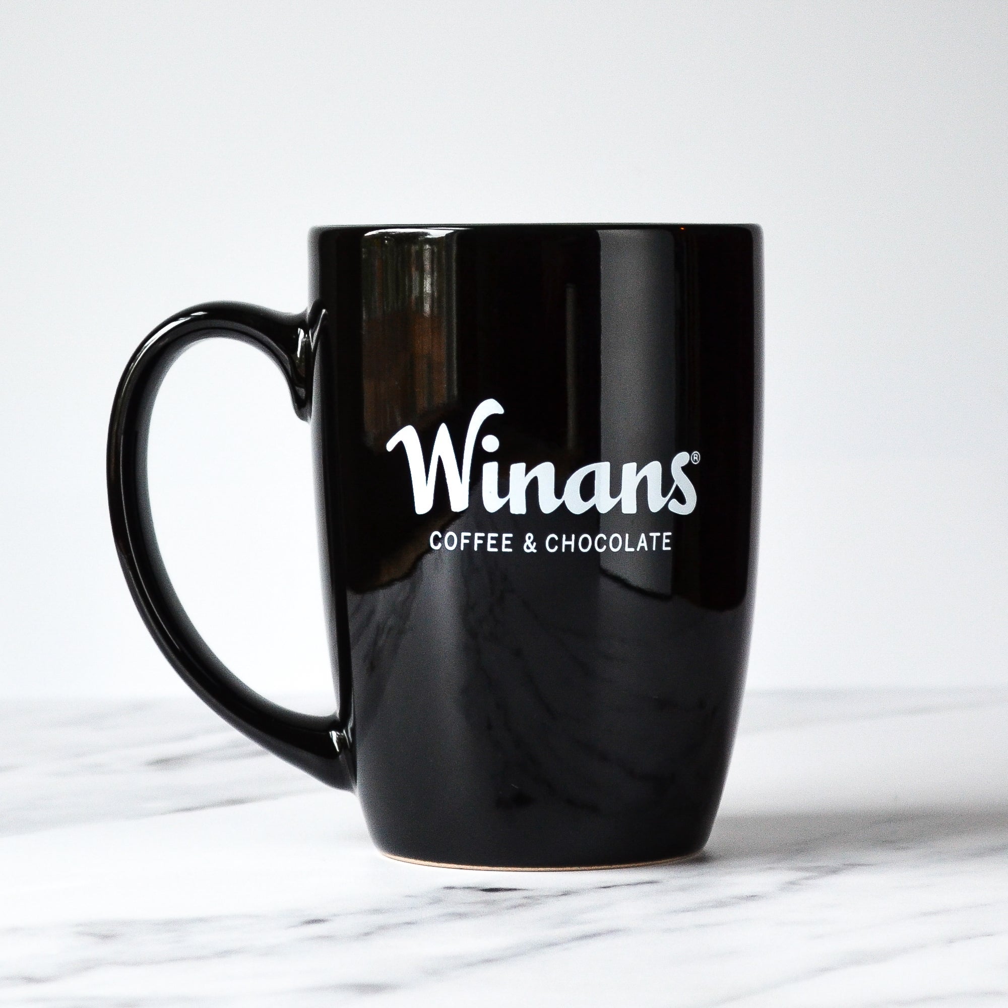 http://winanschocolate.com/cdn/shop/files/Winans_W_logo_mug-2.jpg?v=1697989530