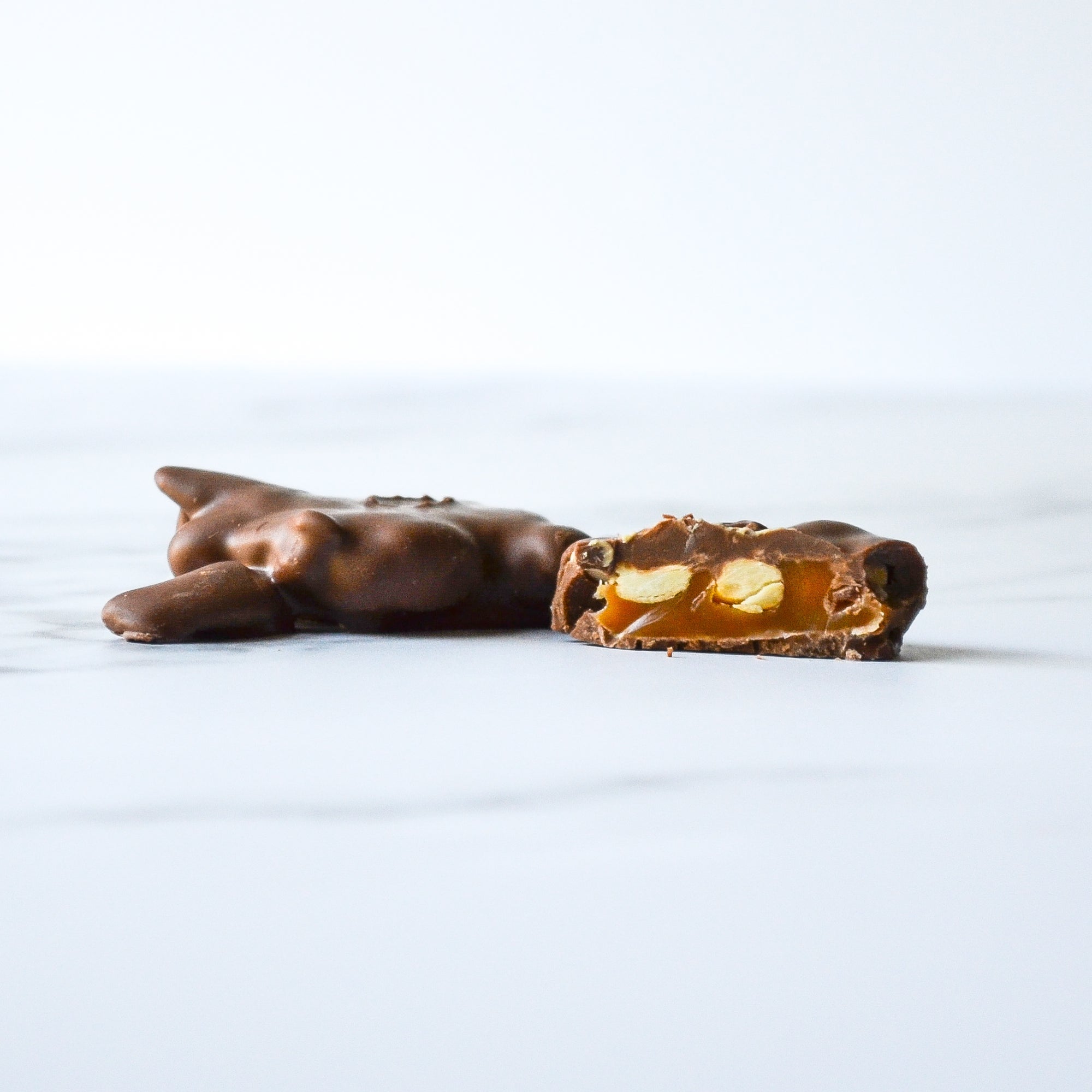 Winans Cashew Wurtles,® our version of a turtle, milk and dark chocolate
